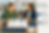 Homeowner reviewing two different homeowners insurance policy options with insurance professional while coverage icons represent broader protection, personal property, and home structure coverage.