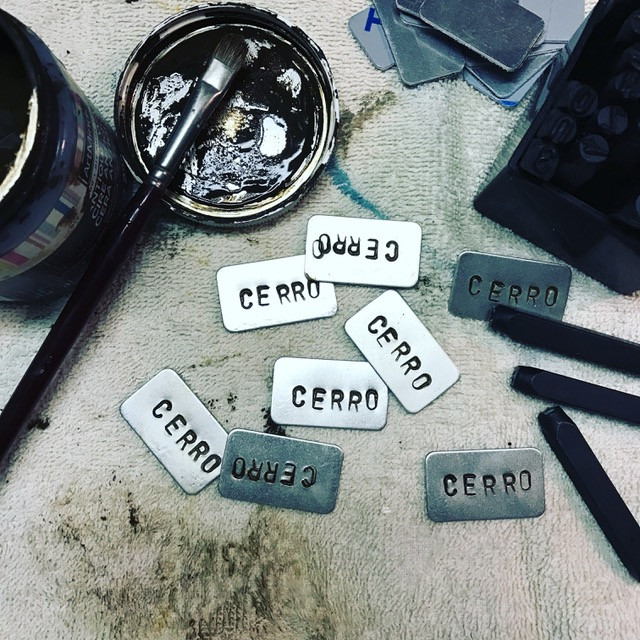 Several CERRO plates with dark wax