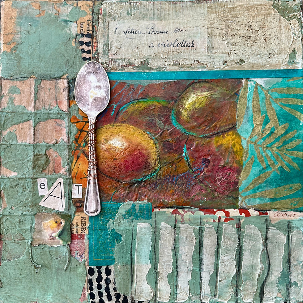 a silver spoon within a mixed media dimensional art piece.