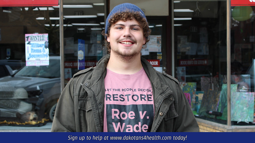 Young man wearing a 'Restore Roe v. Wade - Let the People Decide' t-shirt, symbolizing support for reproductive rights. The image serves as a call to action to sign up and volunteer for the cause. His expression is earnest, reflecting the importance and urgency of the movement.
