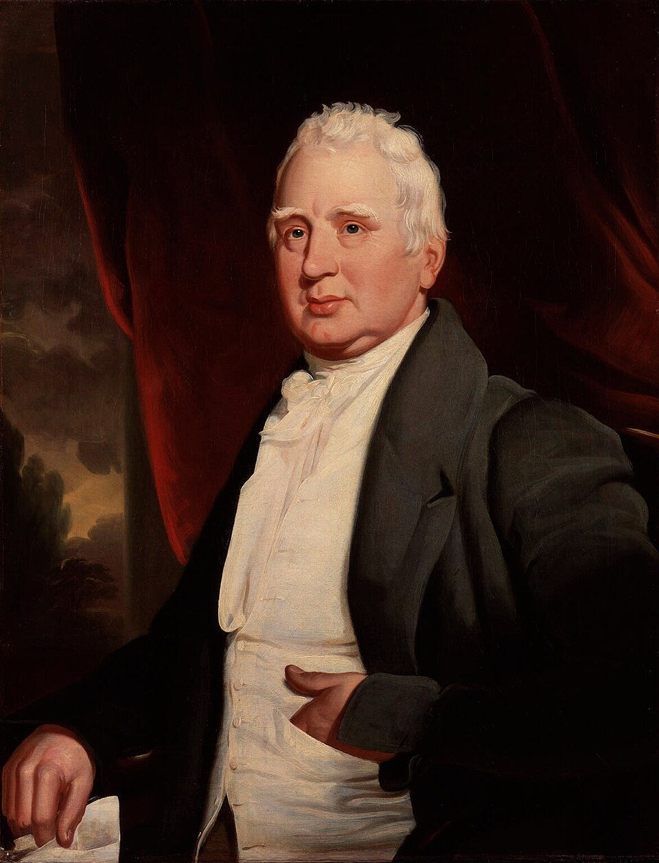 Older man in a dark coat sits with hand in his vest pocket. Background features deep red drapery and a cloudy sky. Calm expression.