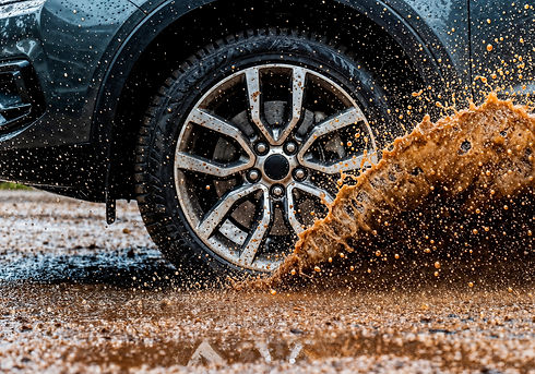 car-wheel-splashing-through-mud.jpg