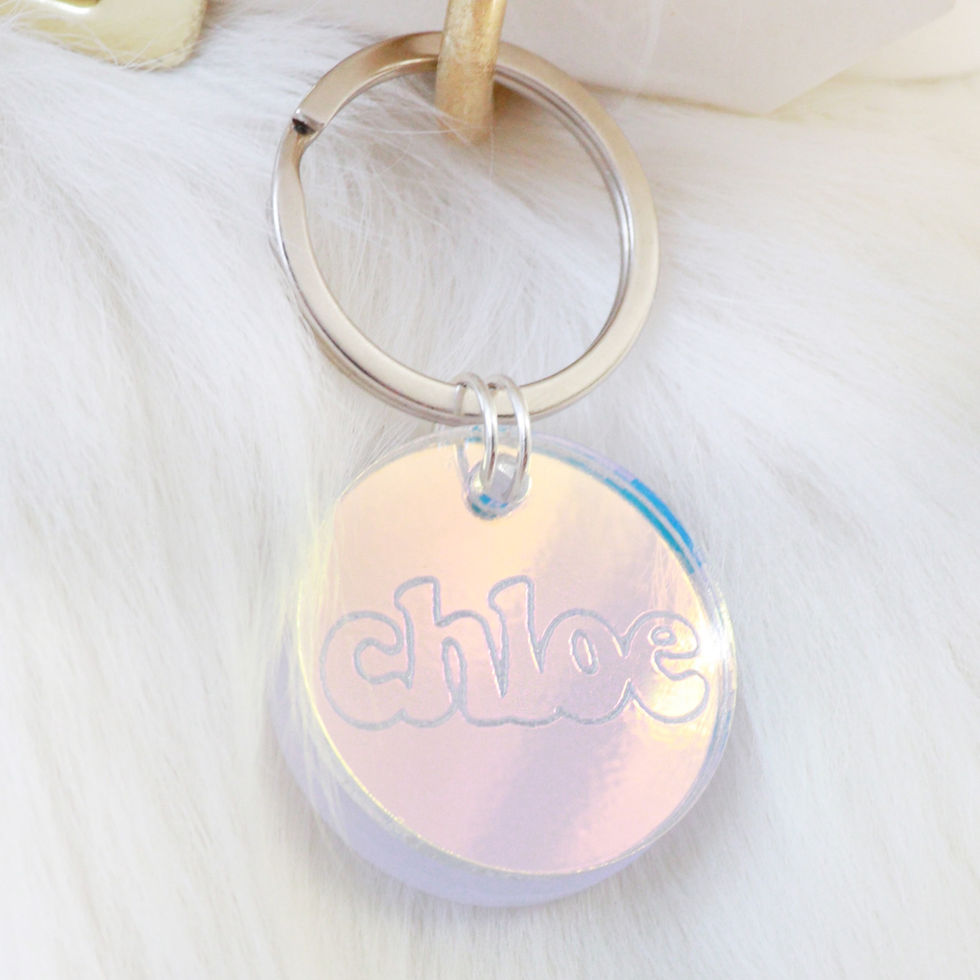 Iridescent pet ID tag made of laser-engraved acrylic. Includes Stainless Steel ring. Waterproof & quiet for dogs & cats.