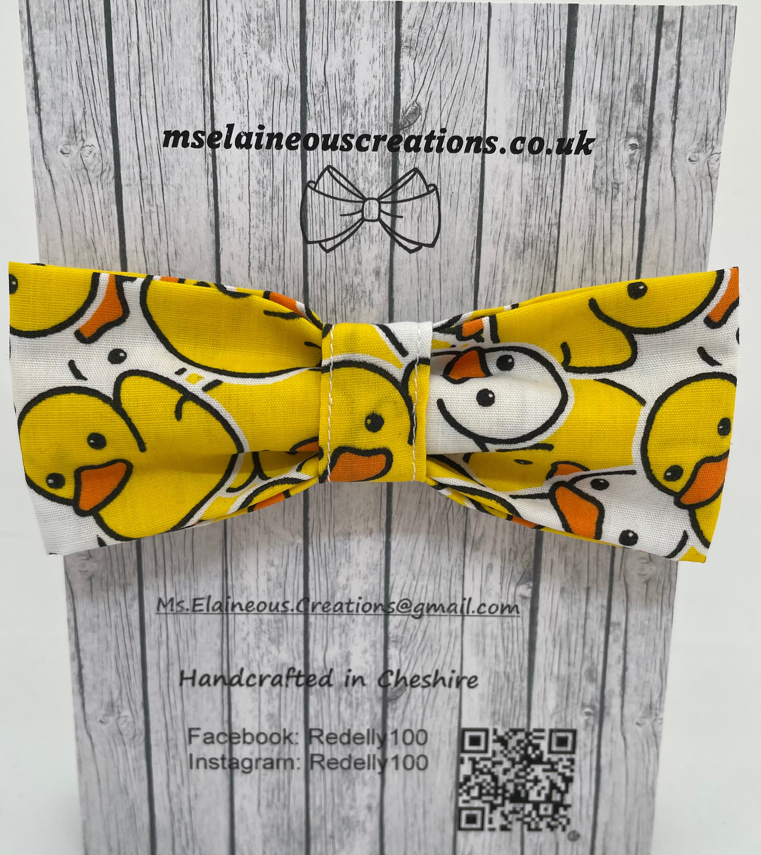 MEDIUM dog bow featuring yellow and white duckies 