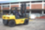 forklift operator riding forklift outside