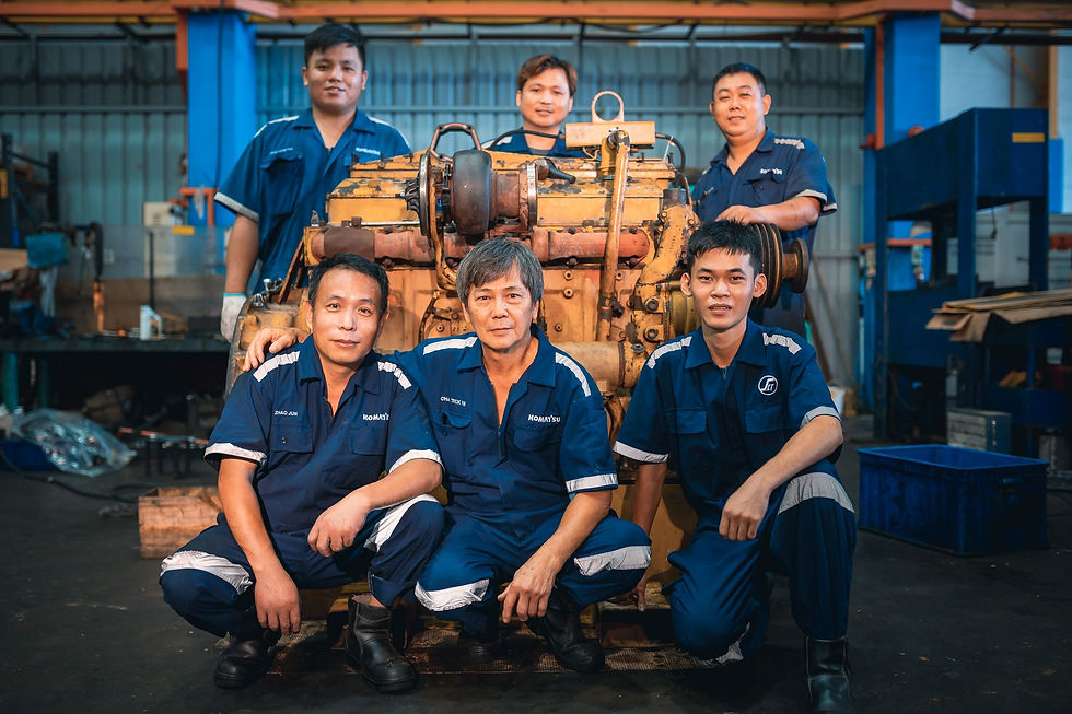 mechanics posing inside workshop