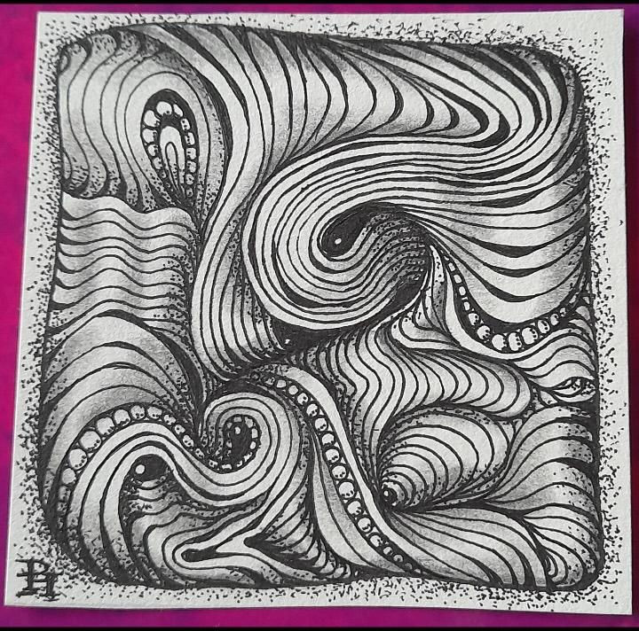 Pauline used a tangle called Scena by Zentangle, and filled some sections with orbs. She also added lots of pen marks to enhance her tile.