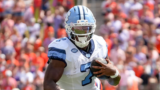 UNC RB Benjamin Hall runs the ball against Clemson.