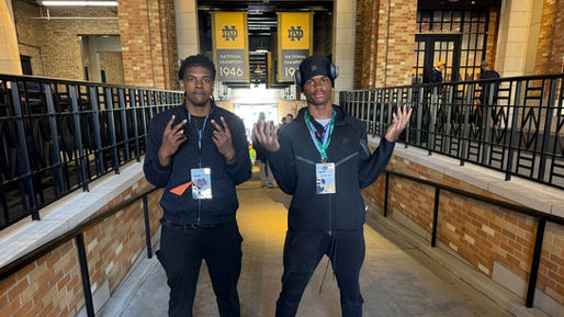 Monshun Sales poses with another recruit during a visit at the 2025 Blue and Gold Game.