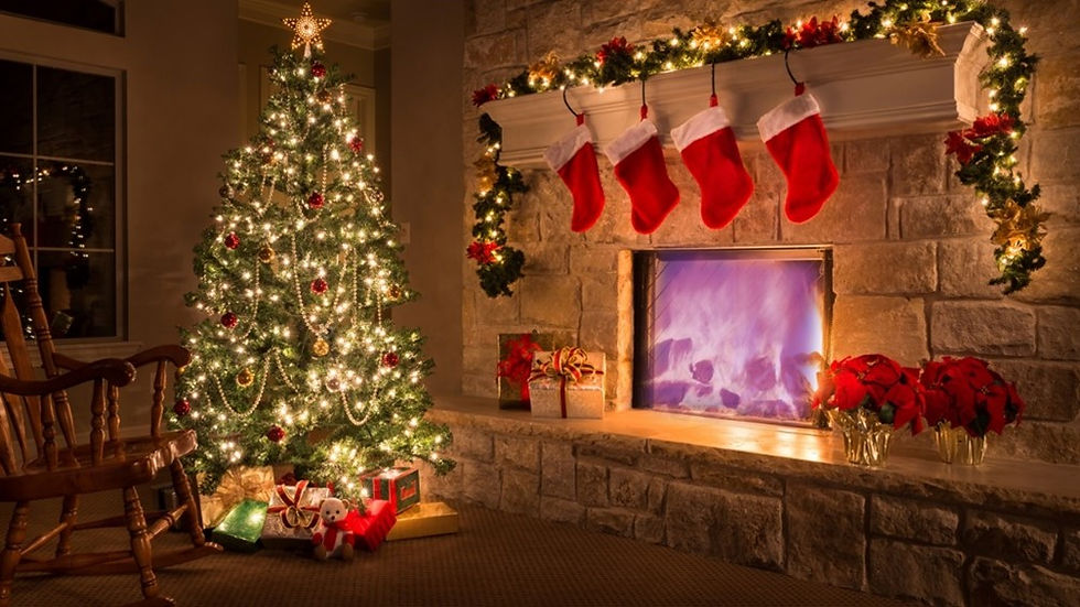 Beautifully decorated room for Christmas including violet flame in the fireplace