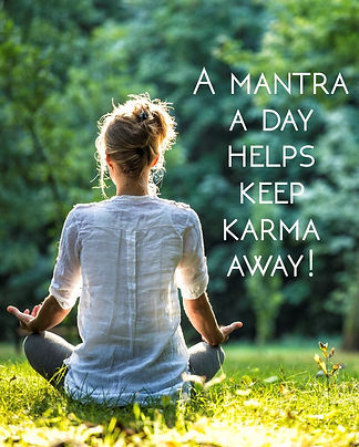 A young woman in meditative posture giving mantras