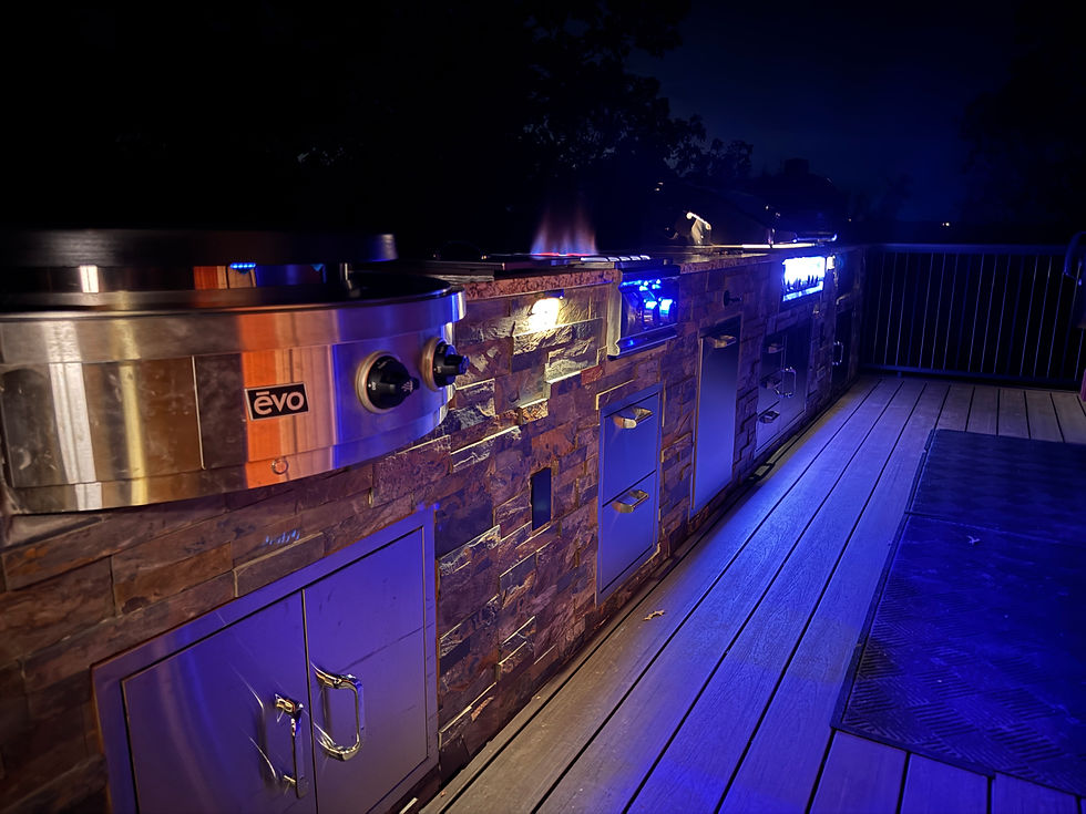 Custom built outdoor kitchen at night in eureka springs arkansas
