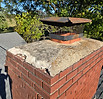 chimney crown missing chunks of mortar needing replaced