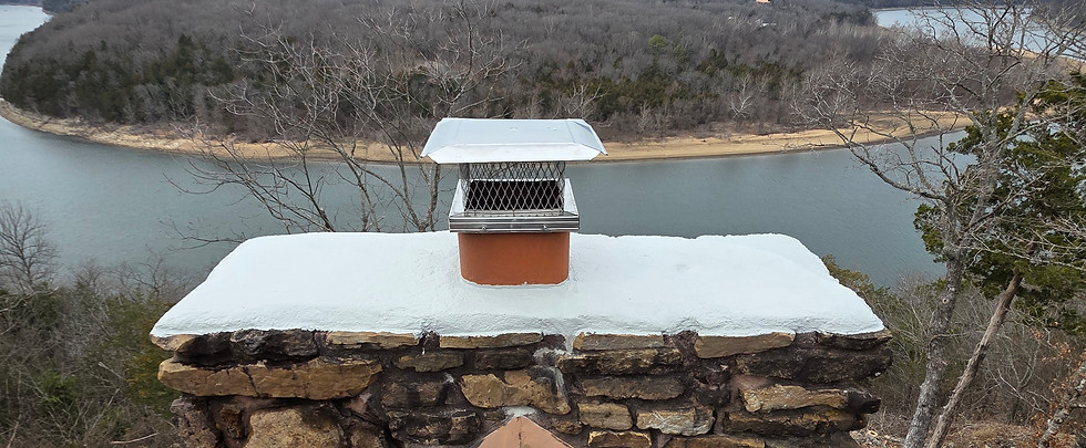 Newly repaired chimney crown protecting brick masonry from water damage