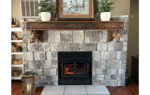 Fireplace in stone veneer custom built hearth