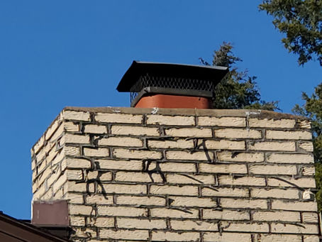Chimney in Kimberling City Missouri in need of professional tuckpointing