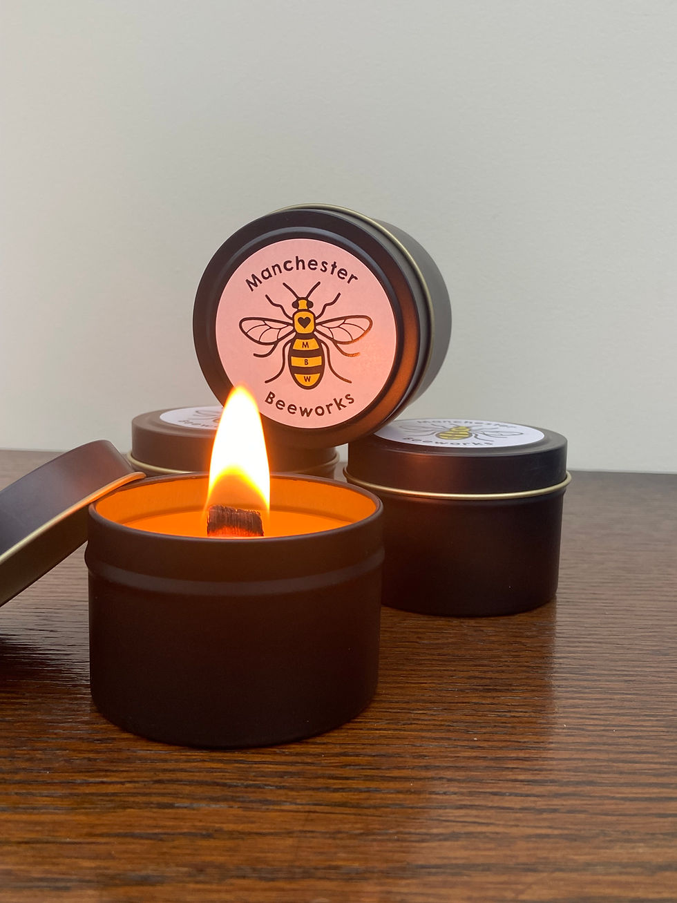 Beeswax Candles With burning Wooden wick in a modern black tin with beeworks logo