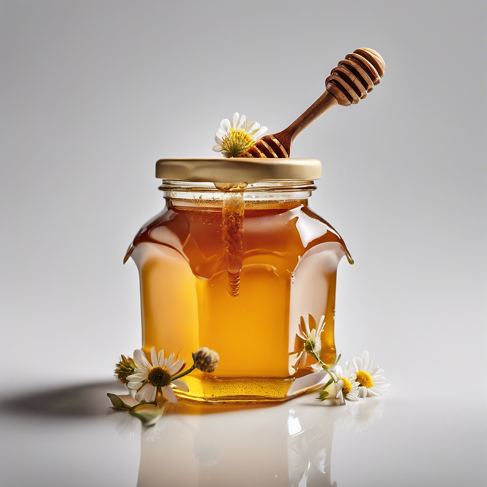 Glass jar of Wildflower Honey surrounded by daisies and complete with a wooden drizzler