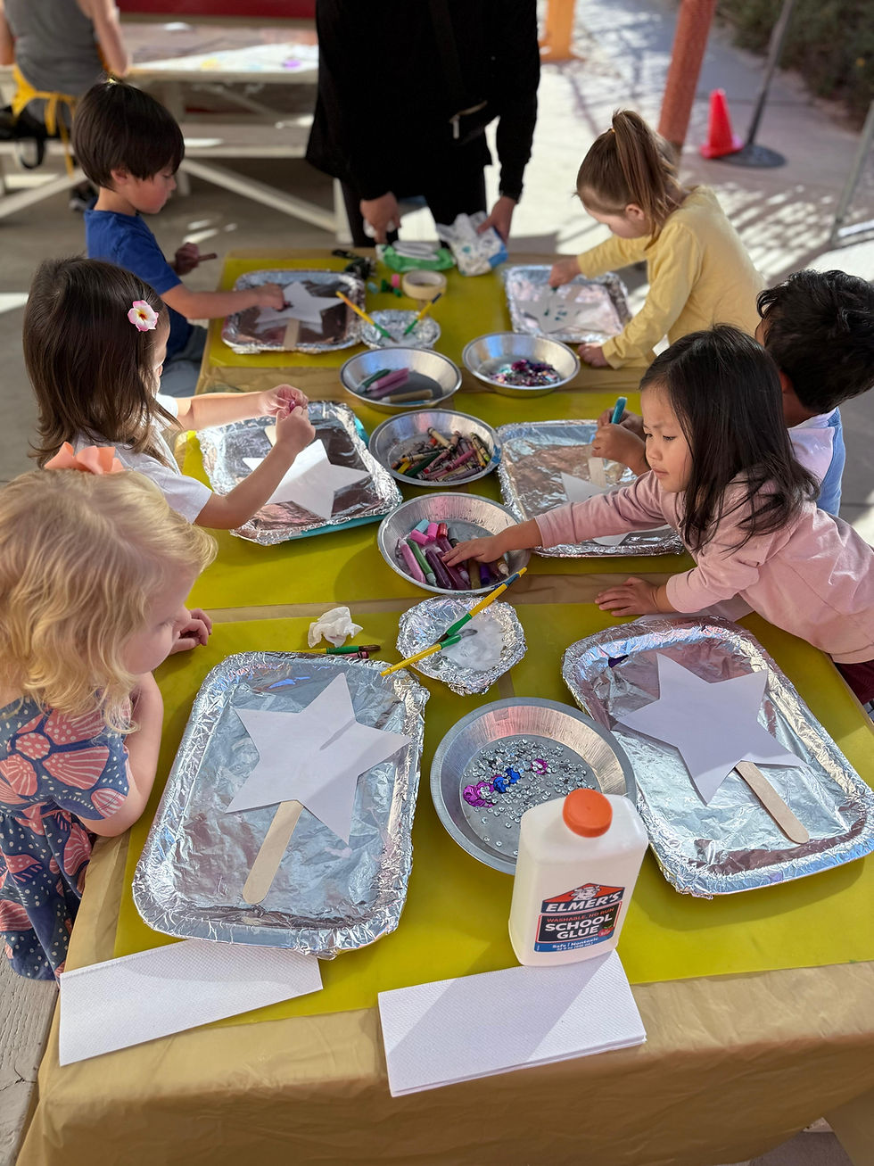 Play based preschool children decorating crafts