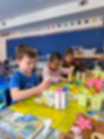 Children doing crafts at a play based preschool