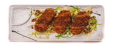 Three breaded cutlets, teriyaki sauce