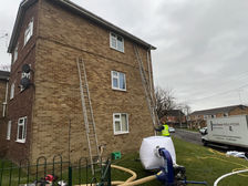 Extraction of old fibre and replaced with new bonded bead insulation - 3 storey flats