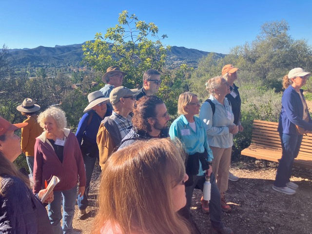 At entrance B of the Nature Trail, everyone in rapt attention to…???