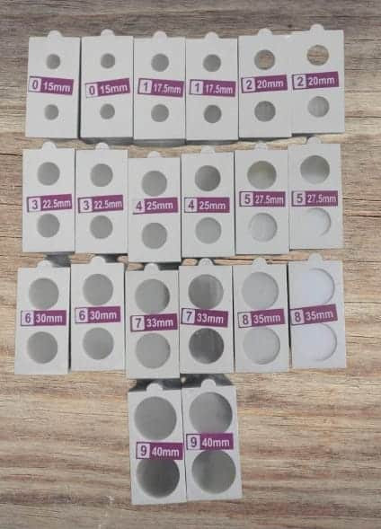 cardboard coin holders (also known as coin flips)