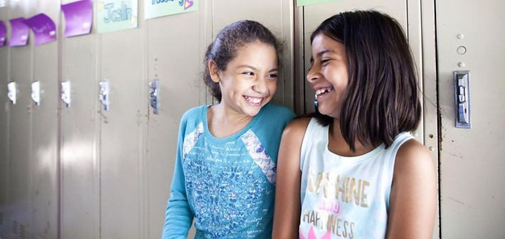 two%20girls%20giggling%20in%20front%20of