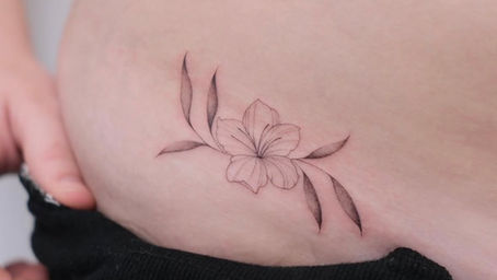 fine line tiny tattoo