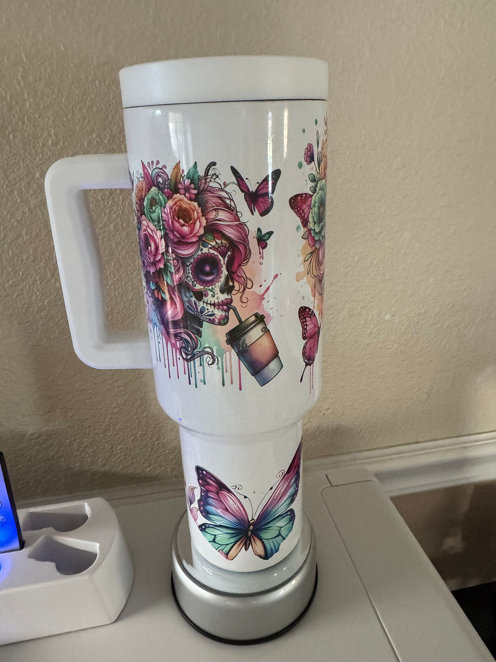 Thumbnail: White travel mug with colorful floral skull and butterfly design.