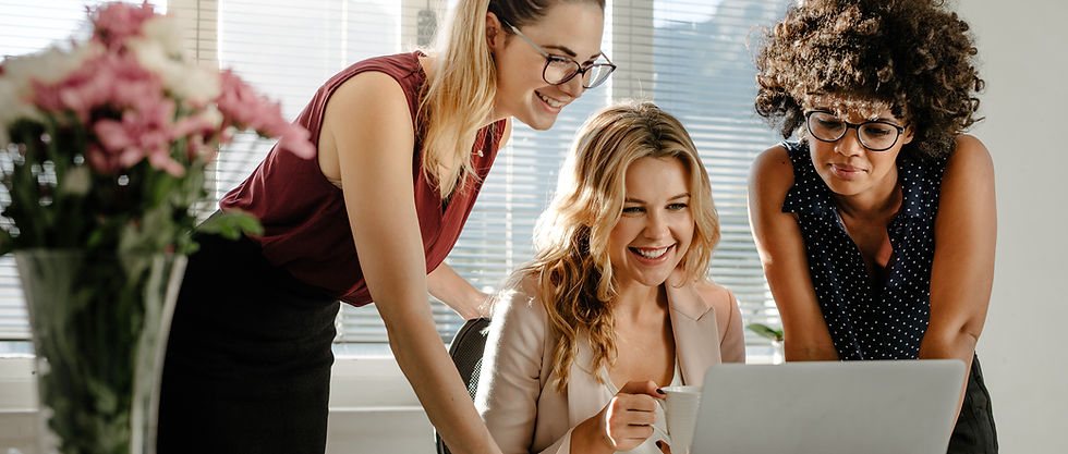 Three Female Developers Collaborating
