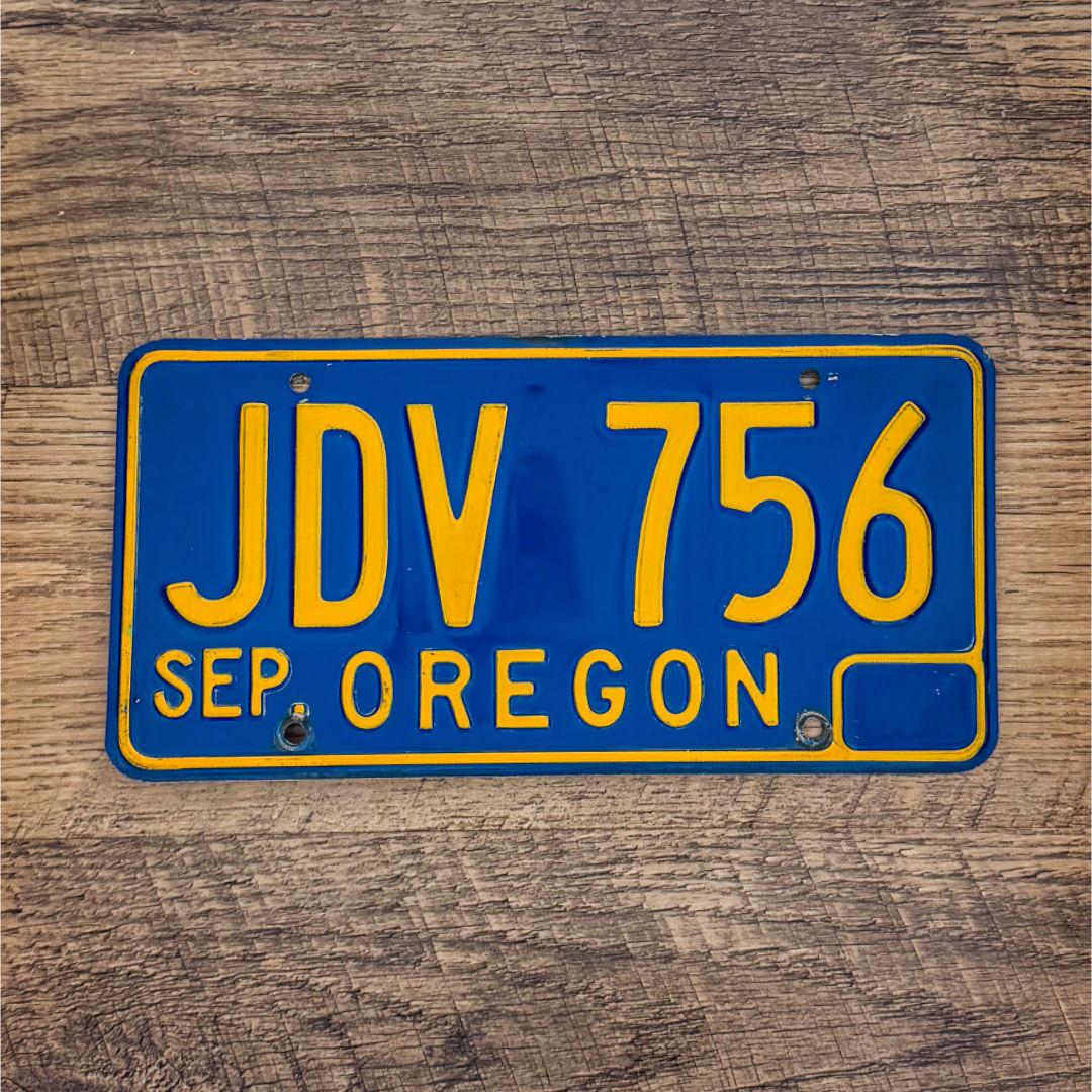 An original Oregon 1965-73 license plate.