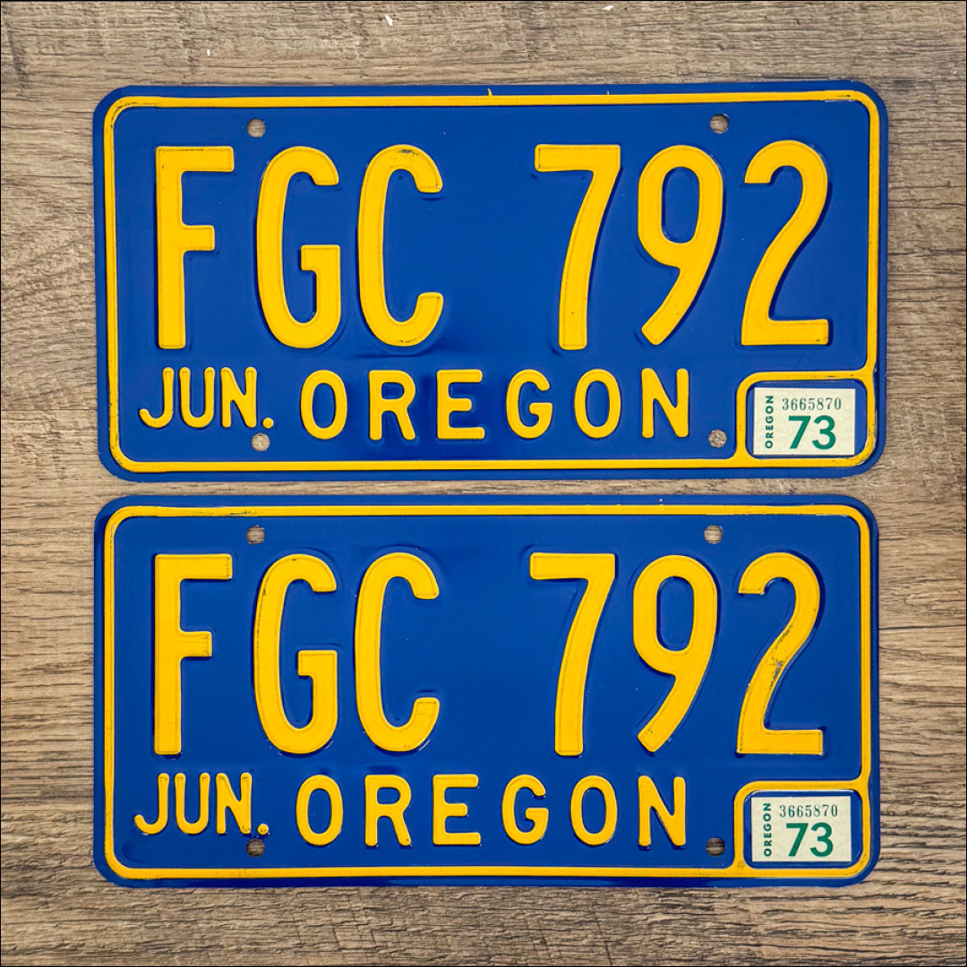 An original pair of Oregon 1965-73 license plates.
