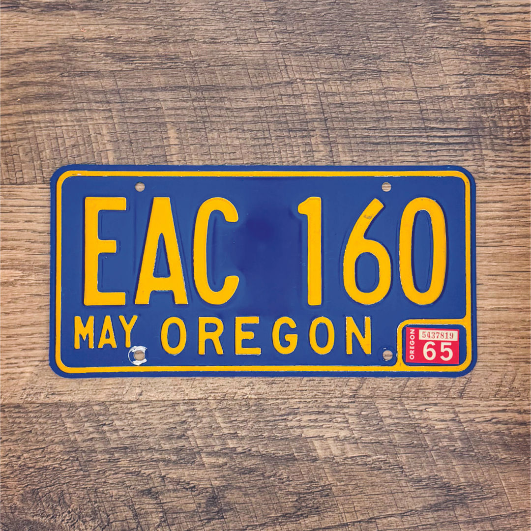 An original Oregon 1965-73 license plate.