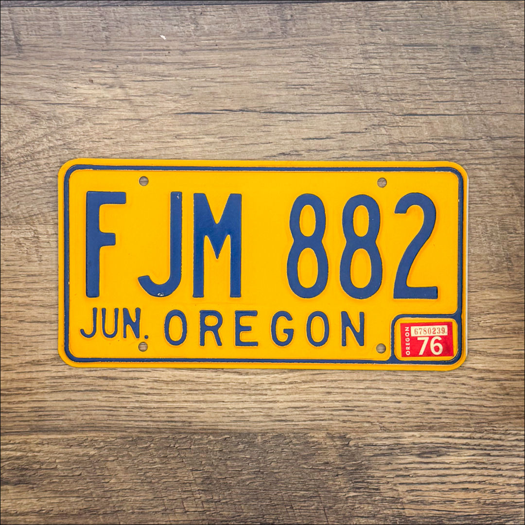 An original Oregon 1974-86 license plate.