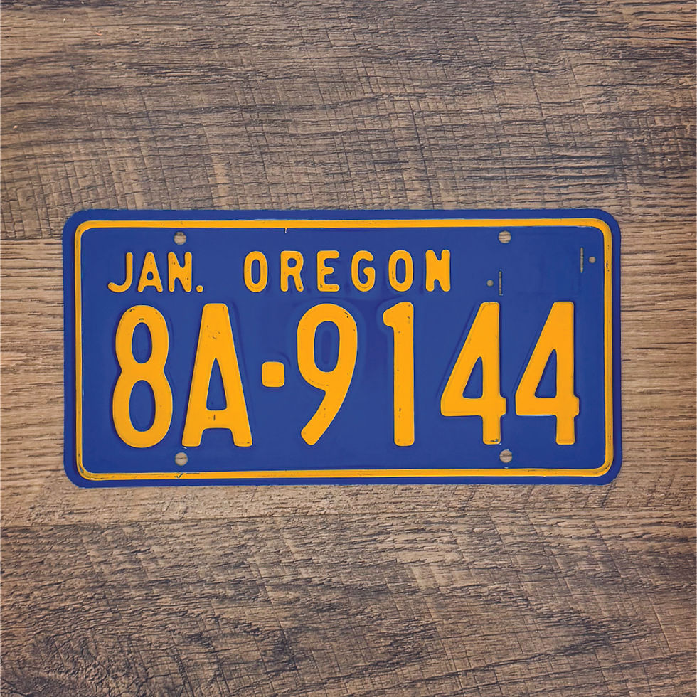 An original Oregon 1957-60 license plate.