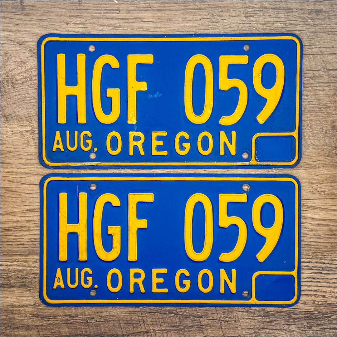 An original pair of Oregon 1965-73 license plates.