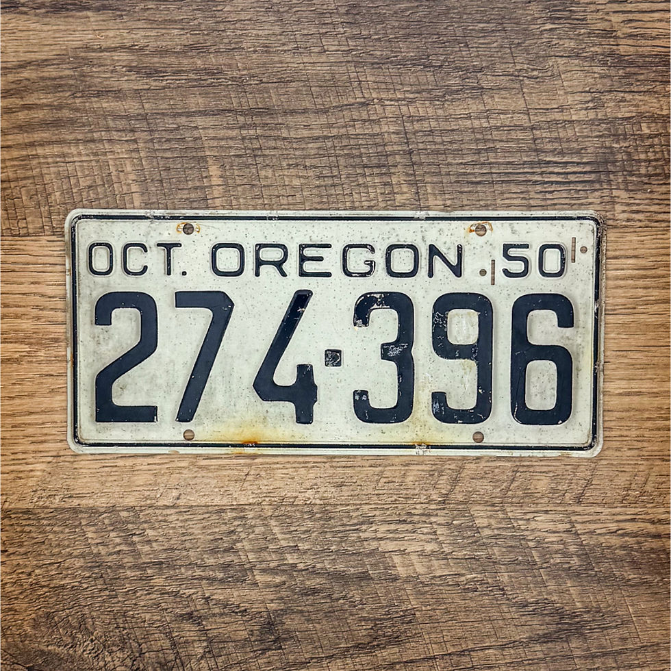 An original Oregon 1950-55 license plate.