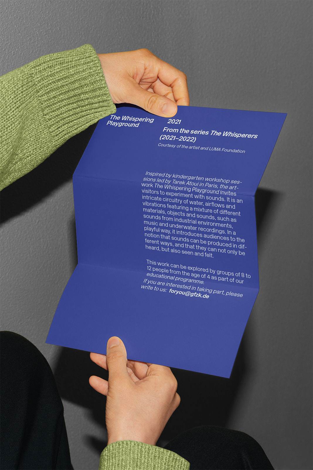 Holding a blue paper: From the series - The Difference 2020-2022 Design Agency