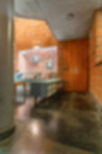 Rustic home interior with exposed brick walls and seating area