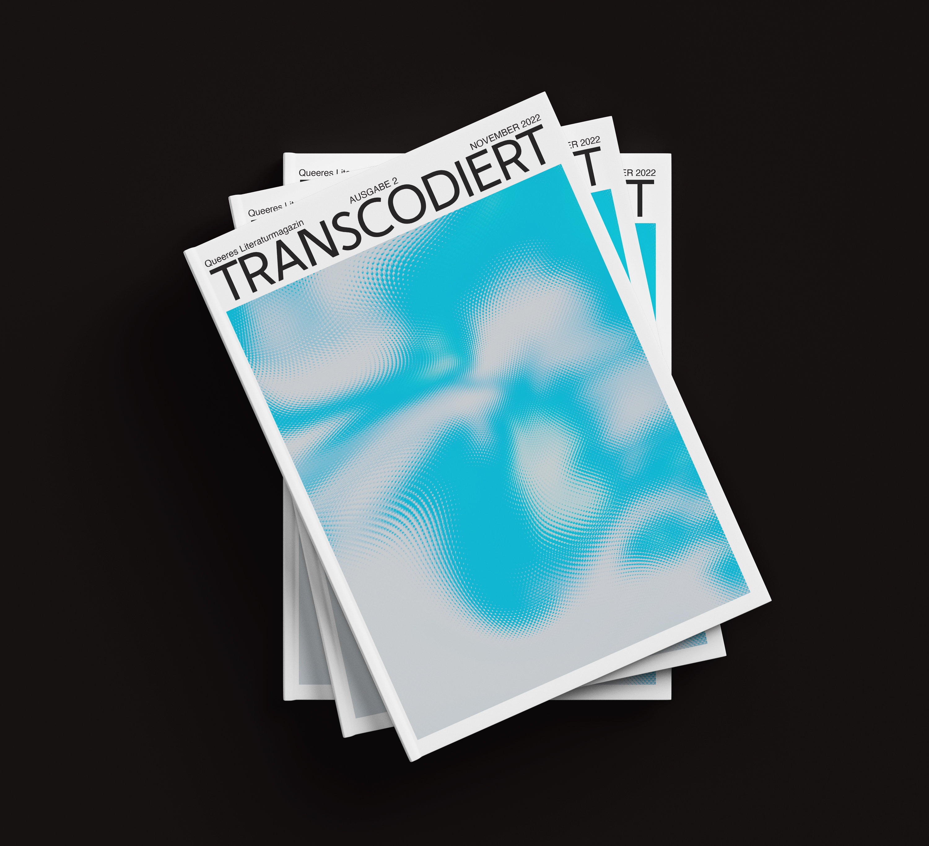 TRANSCODIERT magazine stack with bright blue abstract background, Design Agency.