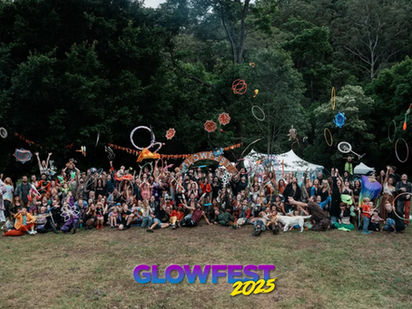 A group of circus flowmies throwing props in the air.