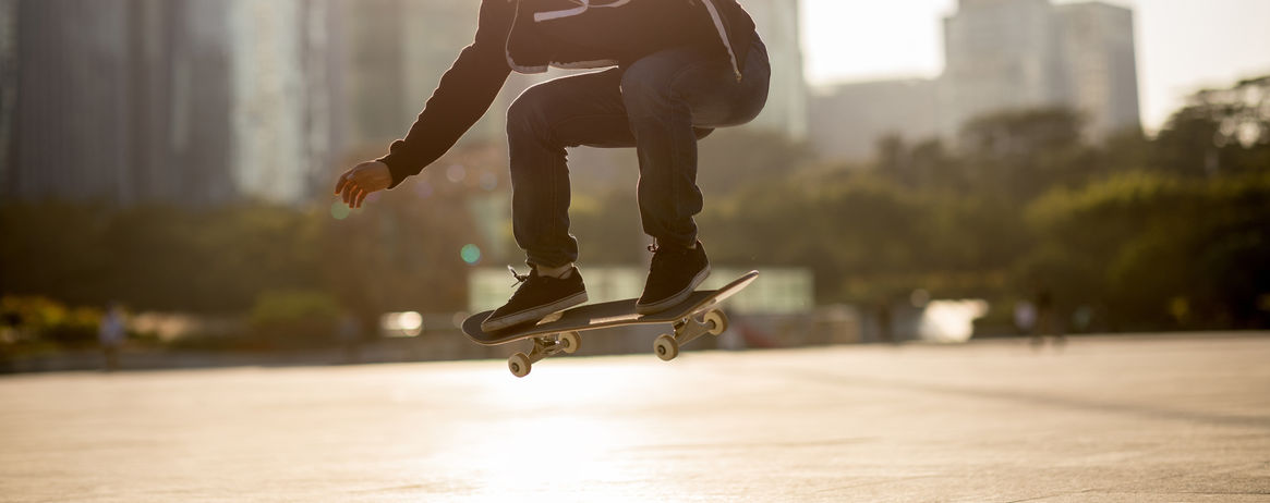 photo of a skateboarder doing a trick