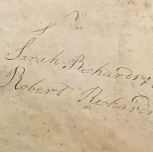 Photo of an inscription which reads of two names and dates.