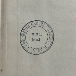 Close up photo of a circular stamp in black ink with the words 'Collegium Santa Maria ad Montem' round the edge and 'BIBL MAJ' in the centre.  