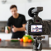 close-up-of-video-camera-filming-young-s