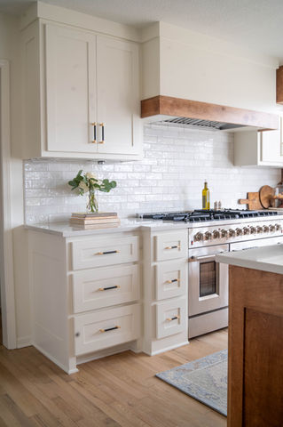 Gorgeous Cozy Kitchen Remodel with Off-White Cabinets and a Large Gas Range