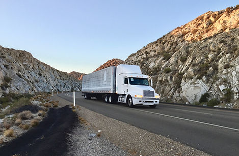 big-rig-on-the-road-through-the-desert-p
