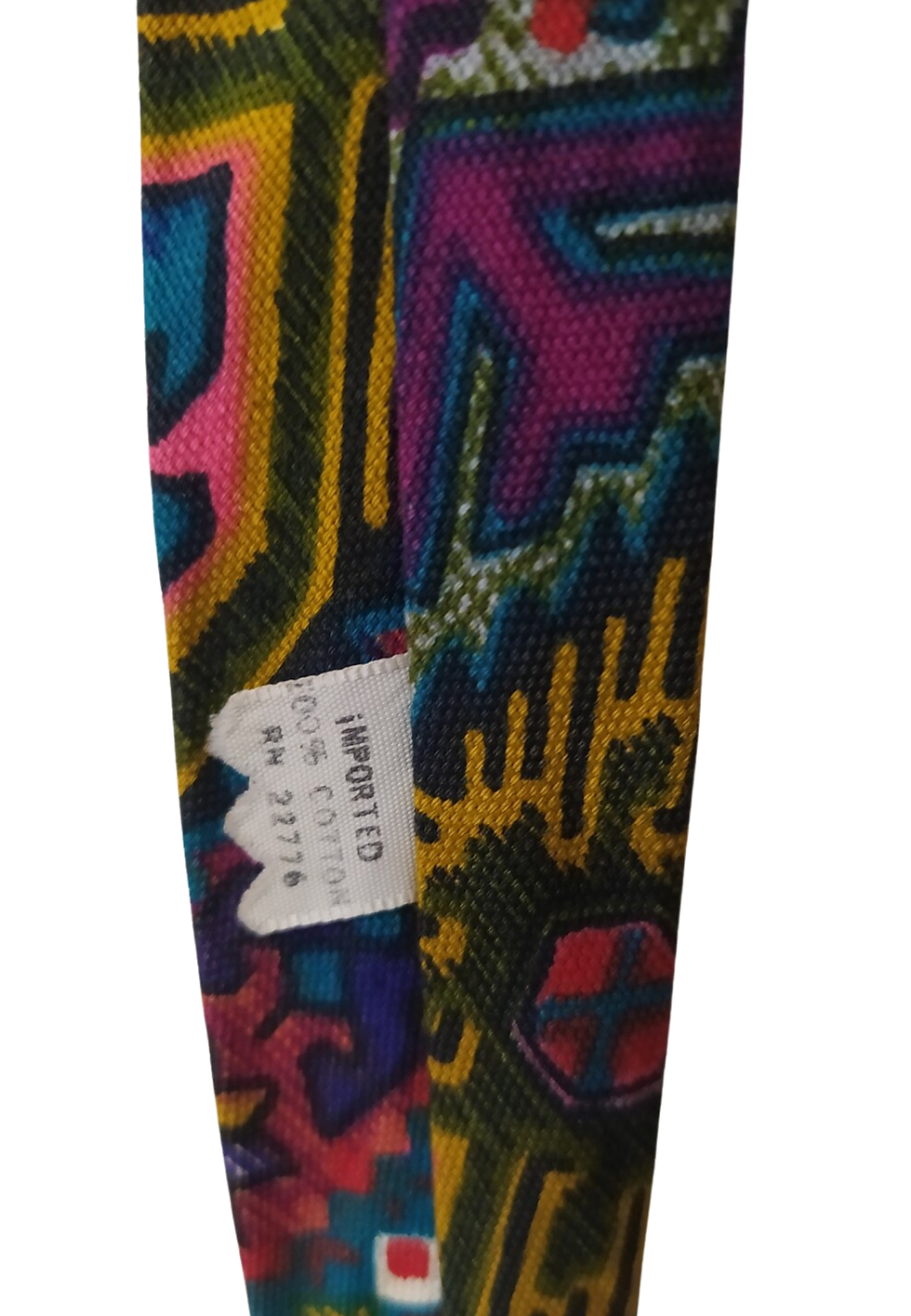 Thumbnail: Colorful patterned tie with label showing text: Imported, 100% Cotton, RN 22776.